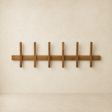 Draper six-hook timber wall rack on warm beige Elara studio wall