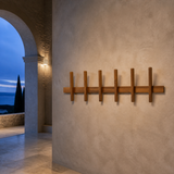 Draper six-hook timber wall rack in a Mediterranean villa at blue hour