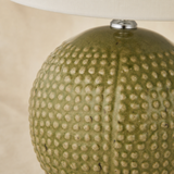 Close-up of Drift Medium lamp radial pebble resin texture and chrome collar