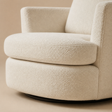 Close-up of Elara Cloud Swivel Chair ivory boucle and swivel base