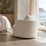 Rear view of Elara Cloud Swivel Chair in a coastal European bedroom