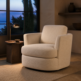 Elara Cloud Swivel Chair in a European reading lounge at blue hour