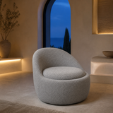 Fenice Curved Chair in an elegant blue-hour Mediterranean interior