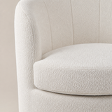 Fenice Round Boucle Ottoman ivory fabric and channel seam detail