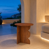 Fiesole Natural Timber Side Table in an elegant blue-hour Mediterranean interior