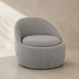 Firenze Curved Boucle Armchair in warm beige Elara studio