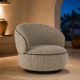 Grazia Cream Boucle Armchair in a Mediterranean blue-hour interior