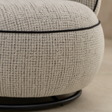 Grazia Armchair textured fabric black piping and ring base detail