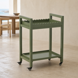 Hudson olive green bar trolley in premium Mediterranean dining lounge