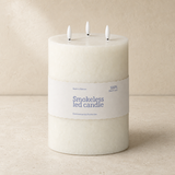 Illume Pillar LED Candle White — warm beige studio view