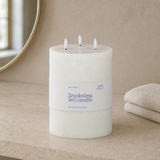 Illume Pillar LED Candle White — travertine spa lifestyle