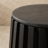 Close-up of Kaito dark marble top and black acacia slatted base