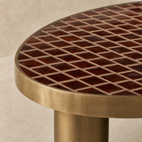 Close-up of Kendall handmade burgundy tiles and brushed antique brass
