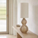 Koda Rattan Lamp in a minimal European entryway