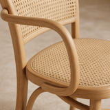 Close-up of the elm bentwood frame and woven rattan craftsmanship