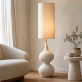 Lido Resin Floor Lamp Natural in a European reading corner