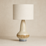Lindi Ceramic Lamp on a warm beige Elara studio background