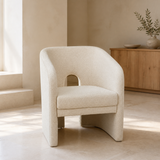 Livenza Cream Fabric Occasional Chair in a warm Mediterranean living room