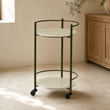 Carrito bar Lorena de mármol y metal verde oliva en interior mediterráneo premium