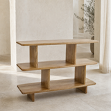 Lucia White — natural wood three-tier shelving unit from an alternate daylight angle