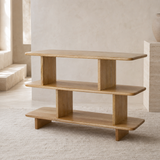 Lucia White — natural wood three-tier shelving unit in a premium Mediterranean interior