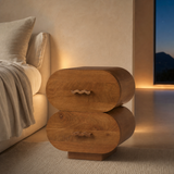 Lugano walnut bedside table in a refined European bedroom at blue hour