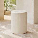 Majolica ivory ceramic tile stool from an alternate courtyard angle
