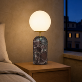 Marino marble lamp glowing in a refined blue-hour bedroom