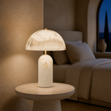 Milano marble resin lamp in a Mediterranean bedroom at dusk