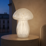 Mushroom Glass LED Lamp White glowing in an evening interior
