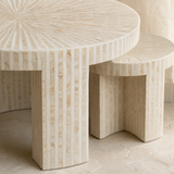 Close-up of the ivory and beige radial inlay finish on the Nassau nesting tables