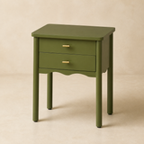 Nelson olive-green two-drawer bedside table in a warm beige studio