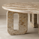 Close-up of Oliveto brecciated stone top and rounded cutout support