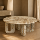 Oliveto sculptural stone table in a warm European interior