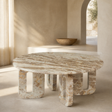 Oliveto sculptural stone table in a Mediterranean interior
