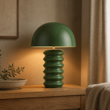 Onda forest green metal lamp illuminated in a warm European interior