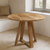 Oristano round natural timber table from an alternate angle
