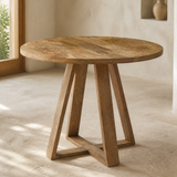 Oristano round natural timber table in a Mediterranean dining nook