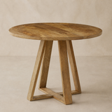 Oristano round natural timber table, warm beige studio view