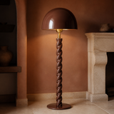 Ormond glossy chocolate floor lamp in a warm evening interior