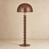 Ormond glossy chocolate floor lamp, warm beige studio view