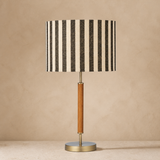 Oslo wood and brass table lamp studio view on warm beige Elara background