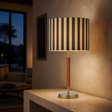 Oslo wood and brass table lamp in refined evening interior