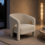 Paige natural boucle armchair in a refined evening interior