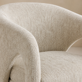 Close-up of Paige natural ribbed boucle upholstery and tailoring