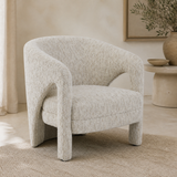 Paige natural boucle armchair in a premium Mediterranean interior