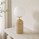 Palma travertine globe table lamp from an alternate angle