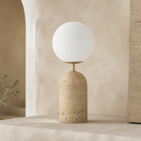 Palma travertine globe table lamp in a premium Mediterranean interior