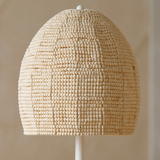 Close-up of the Perline lamp pale natural wood bead shade