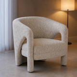 Perugia textured ivory accent chair in an elegant evening interior